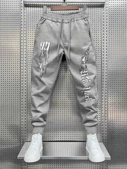 Autumn New Men's Fitness Training Letter Printed Micro Elastic Comfortable Drawstring Pants Outdoor Urban Sports Pants